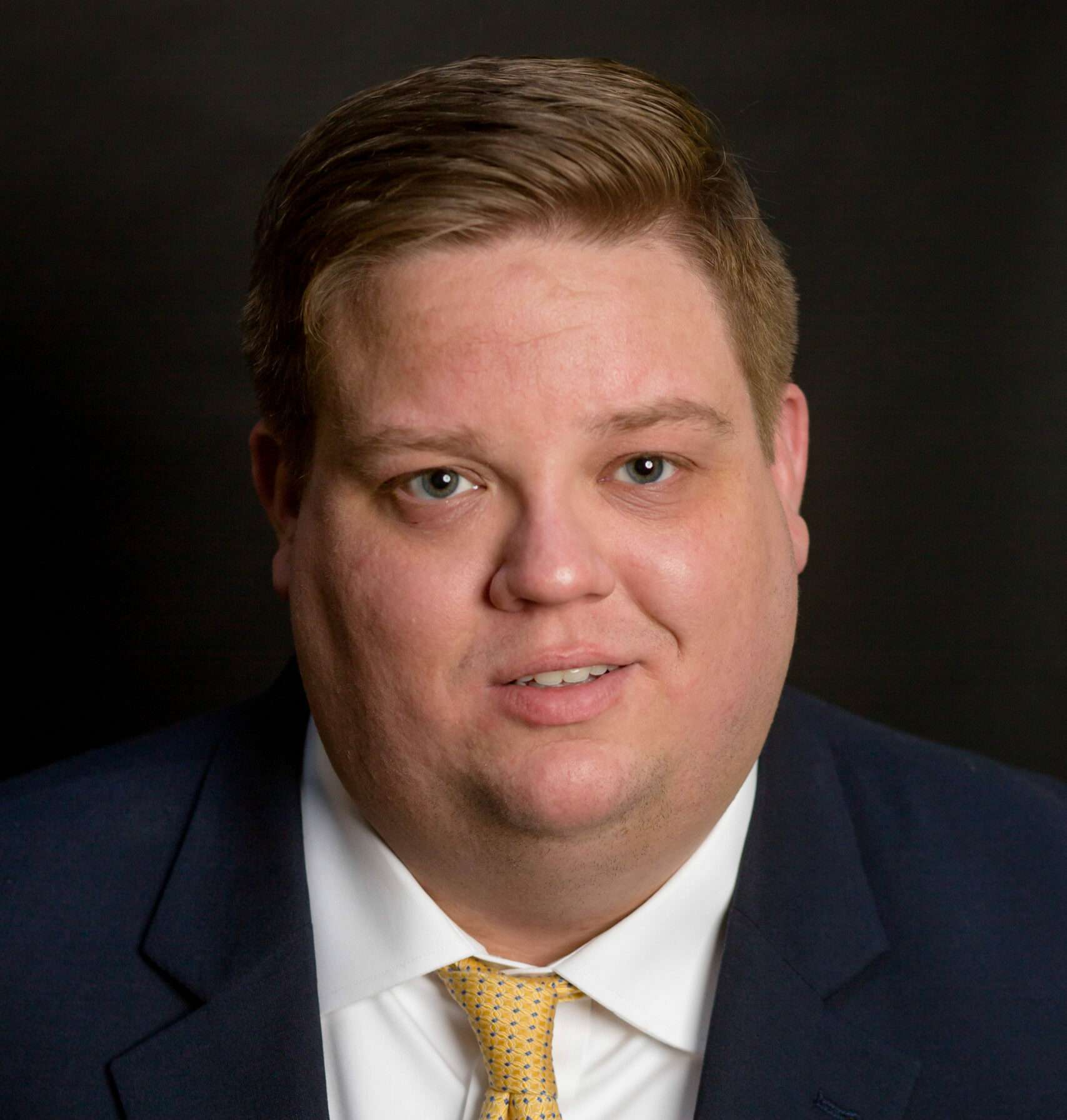 headshot of C Jordan Godwin