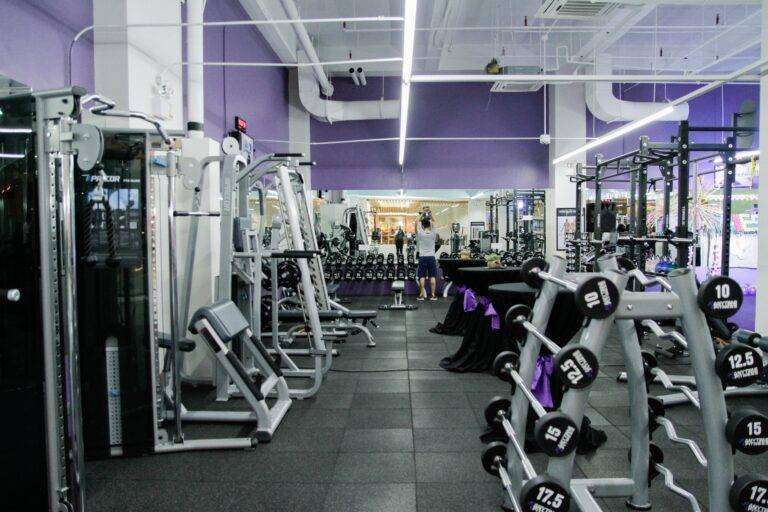 photo of a gym with a purple wall